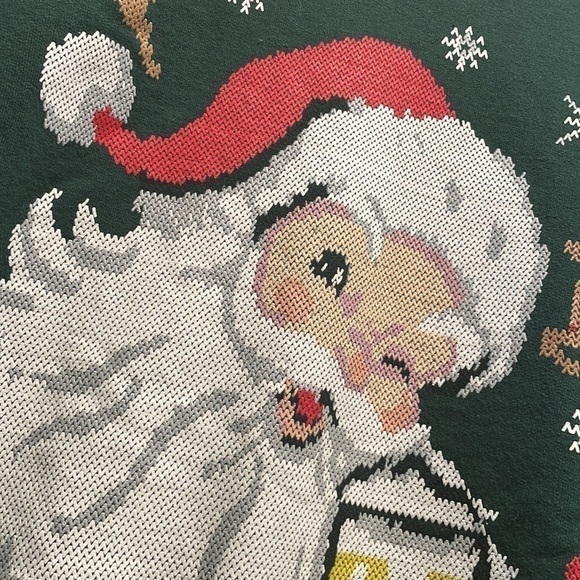 𝅺Santa Faux Cross Stitch Sweatshirt Winking Drinking a Beer saying, “Cheers!” - Picture 2 of 3